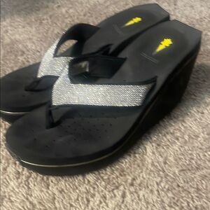 Volatile Black and Silver Wedge Sandals
